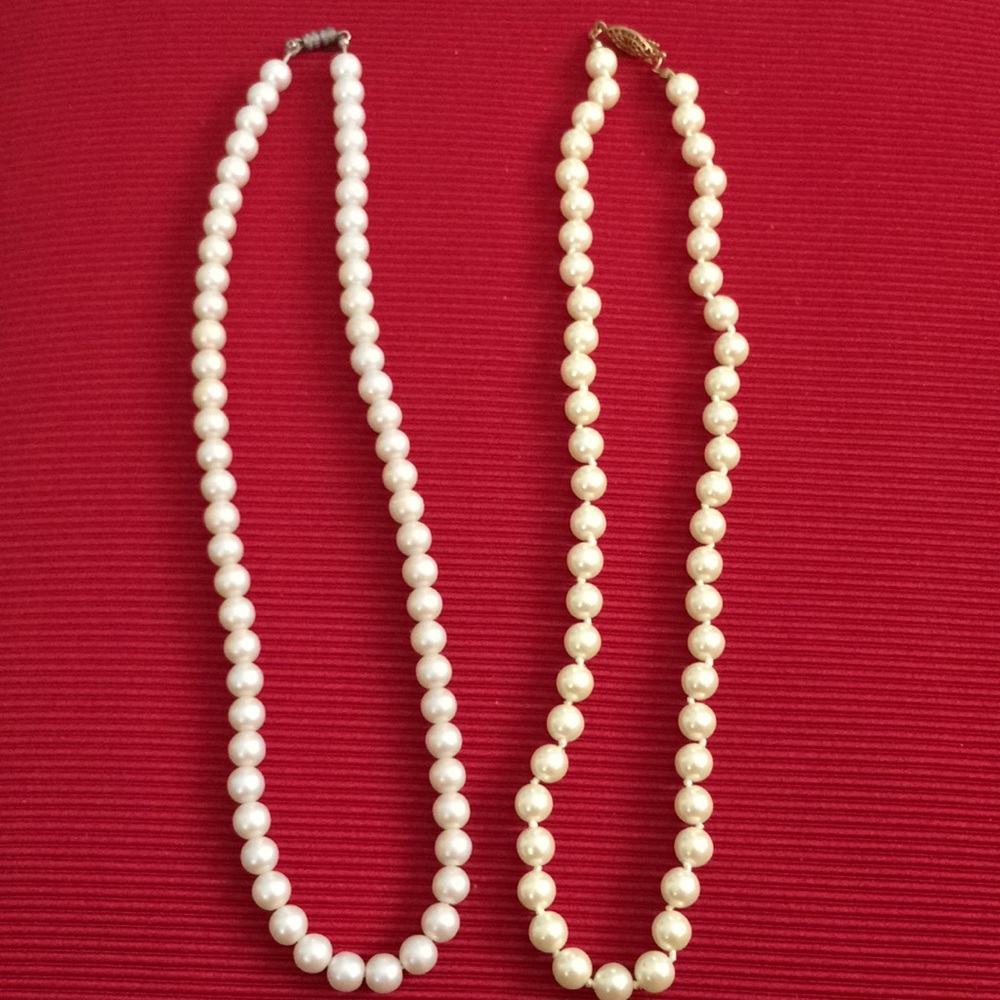 2- faux pearl necklaces 19” each